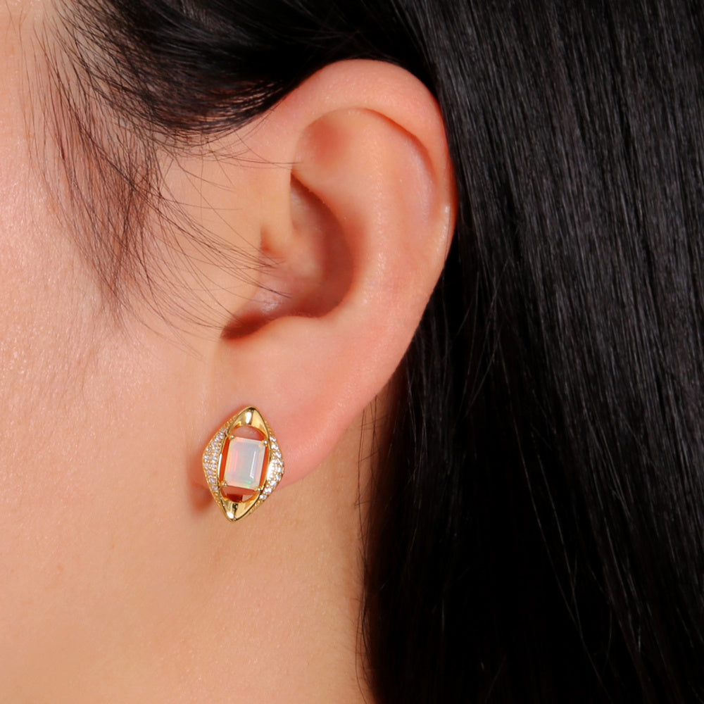 ‘Cecily’ Emerald Cut Opal Rhombus Earrings – yellow on ear