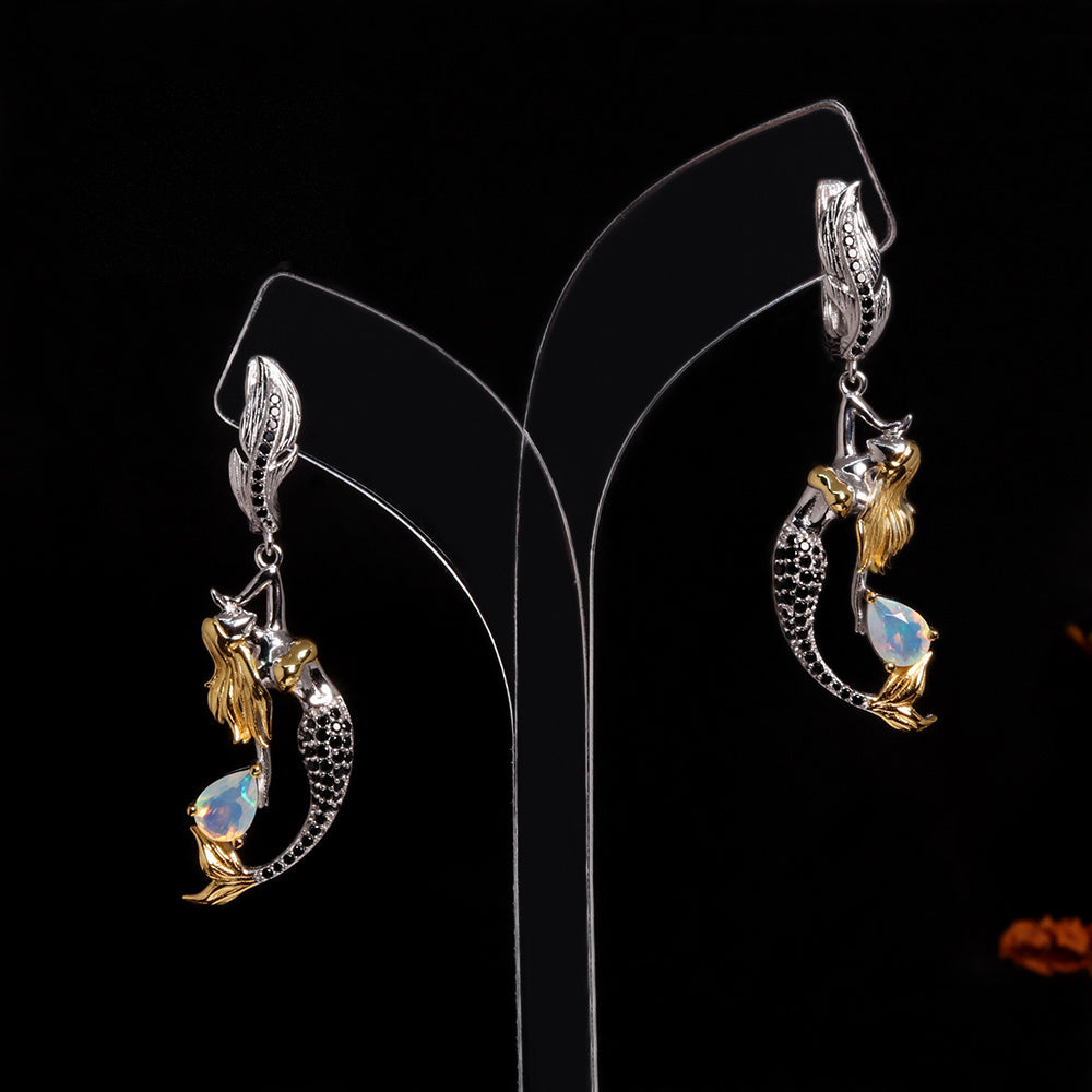 ‘Tamsin’ Mermaid Pear Opal Drop Earrings – on display stand