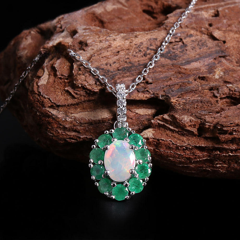 ‘Bexley’ Oval Opal Emerald Halo Pendant – on wood
