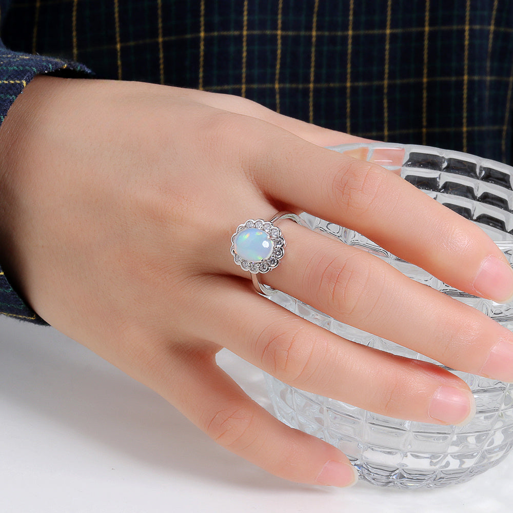 ‘Lavender’ Oval Opal Flower Halo Ring – on hand