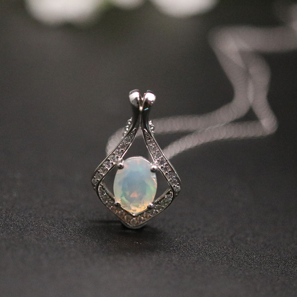 ‘Lark’ Oval Opal Kite Frame Pendant – angled on chain