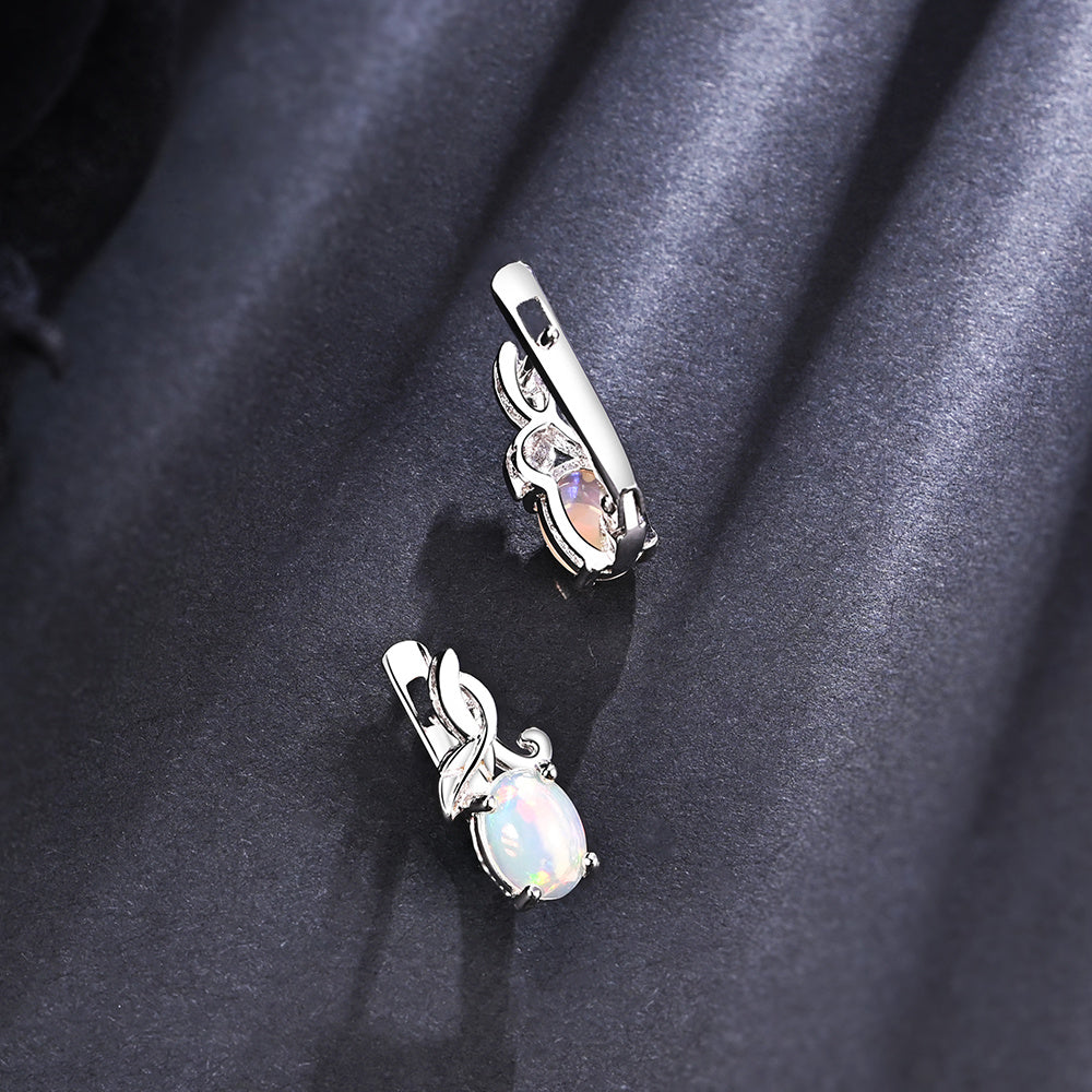 ‘Sage’ Oval Opal Leaf Vine Earrings – on dark fabric