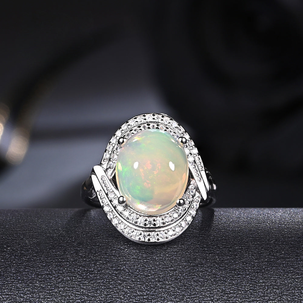 ‘Cove’ Oval Opal Swirl Halo Ring – top view