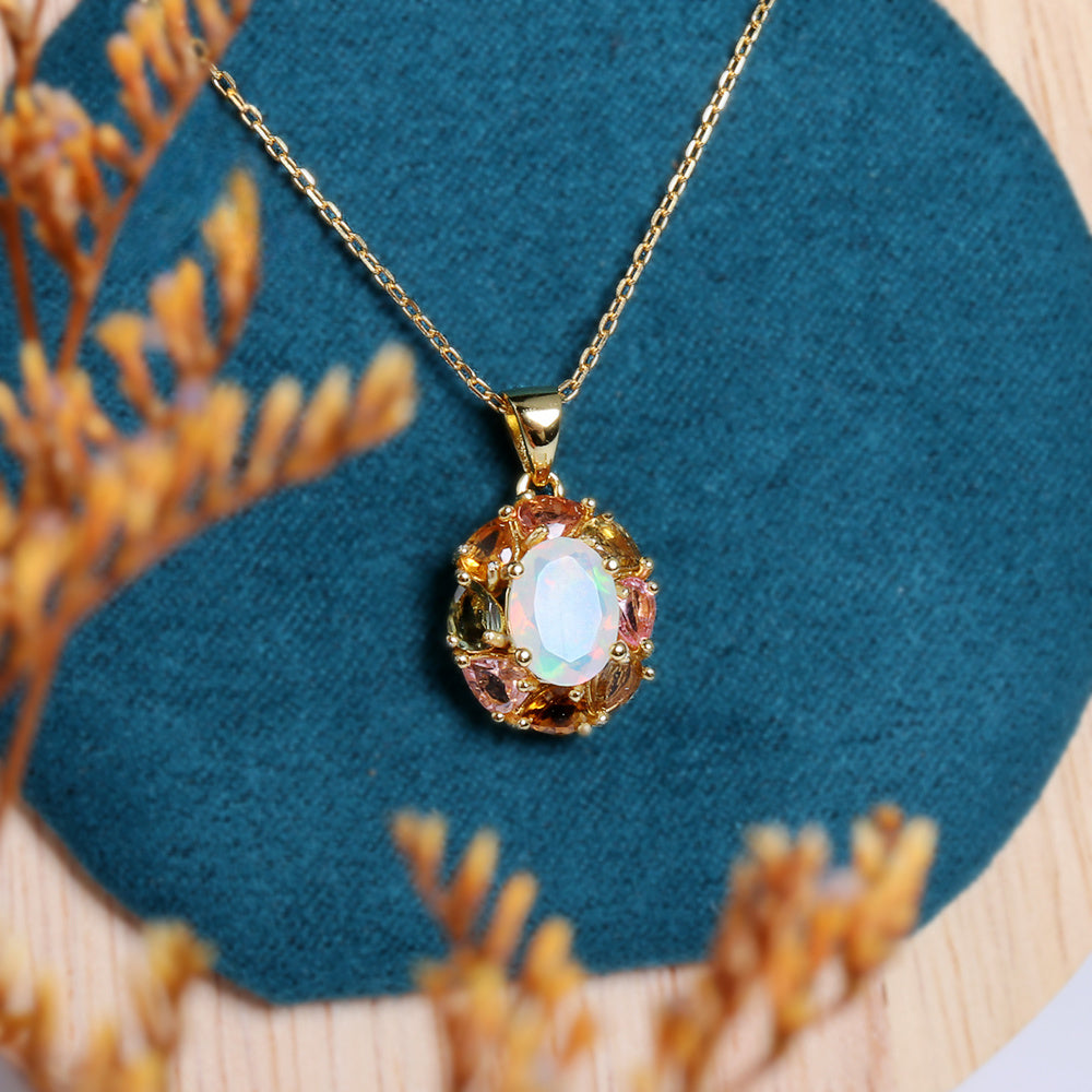 ‘Carmel’ Oval Opal Tourmaline Halo Pendant – styled on velvet