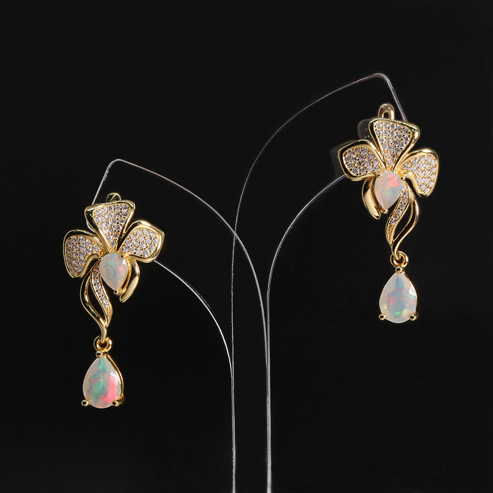 ‘Mimosa’ Pave Flower Opal Drop Earrings – on display stand