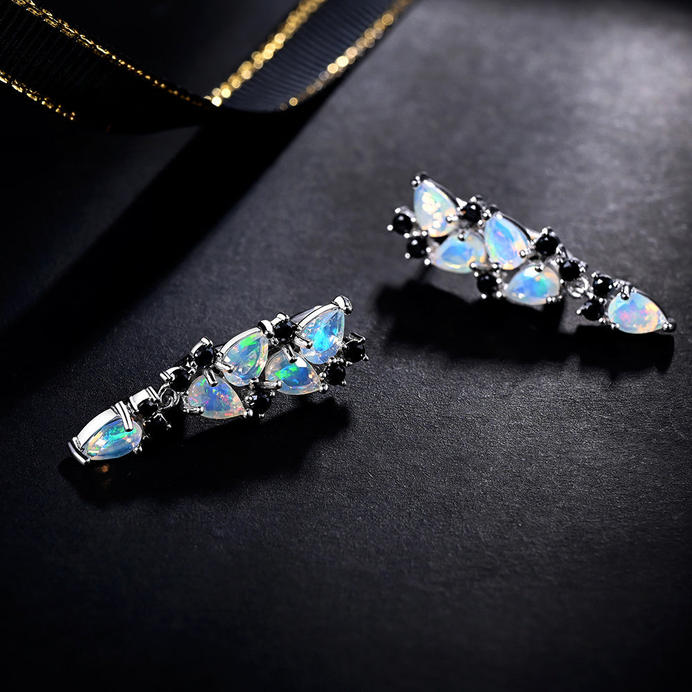 ‘Waverly’ Pear Opal Cascade Cluster Earrings – flat lay slate