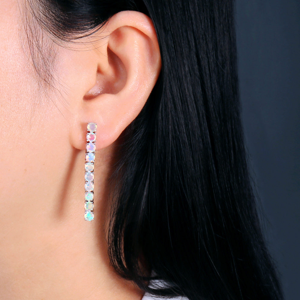 ‘Cora’ Round Opal Linear Bar Earrings – on ear