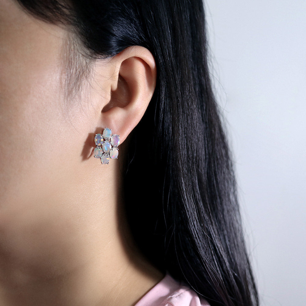 ‘Jubilee’ Seven Oval Opal Cluster Earrings – on ear