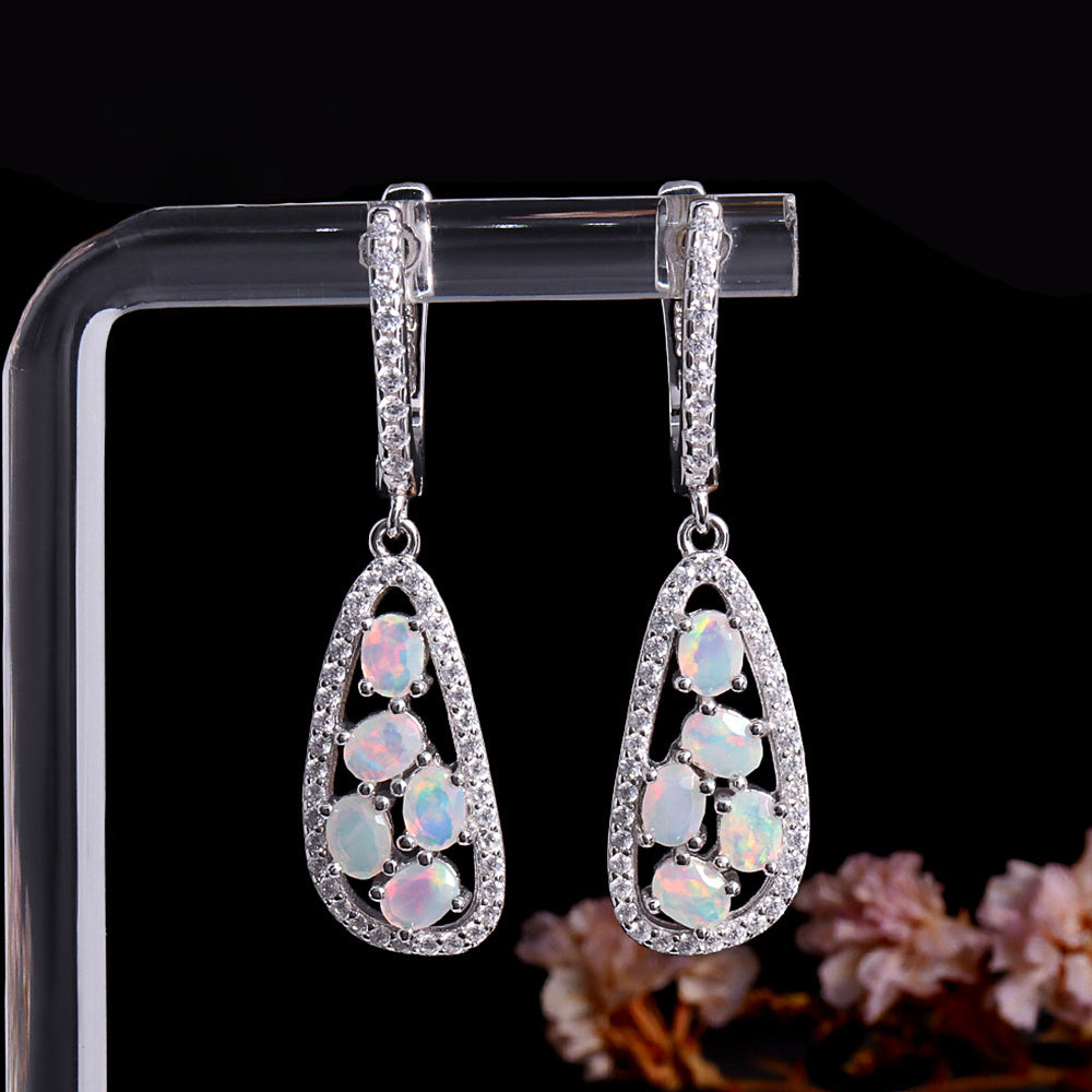 ‘Whitley’ Teardrop Opal Cluster Drop Earrings – on display stand