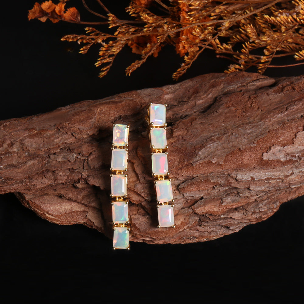 ‘Savannah’ Baguette Opal Line Drop Earrings – yellow on wood
