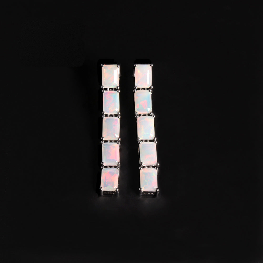 ‘Savannah’ Baguette Opal Line Drop Earrings – white pair front