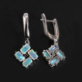 ‘Phoenix’ Baguette Opal Pinwheel Drop Earrings – front and side