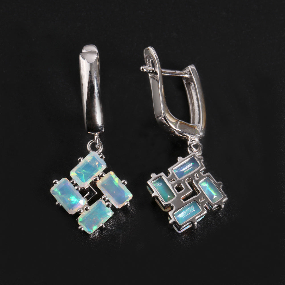 ‘Phoenix’ Baguette Opal Pinwheel Drop Earrings – front and side