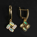 ‘Phoenix’ Baguette Opal Pinwheel Drop Earrings – front and side