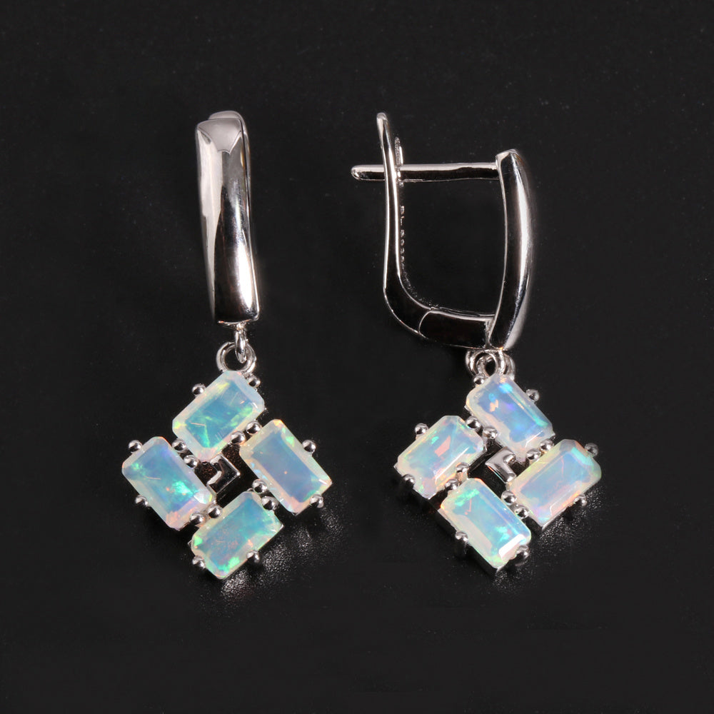 ‘Phoenix’ Baguette Opal Pinwheel Drop Earrings – front and side angle