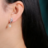 ‘Millie’ Butterfly Topaz Pear Opal Earrings – on ear