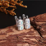 ‘Hadley’ Cushion Opal Double Halo Earrings – on wood