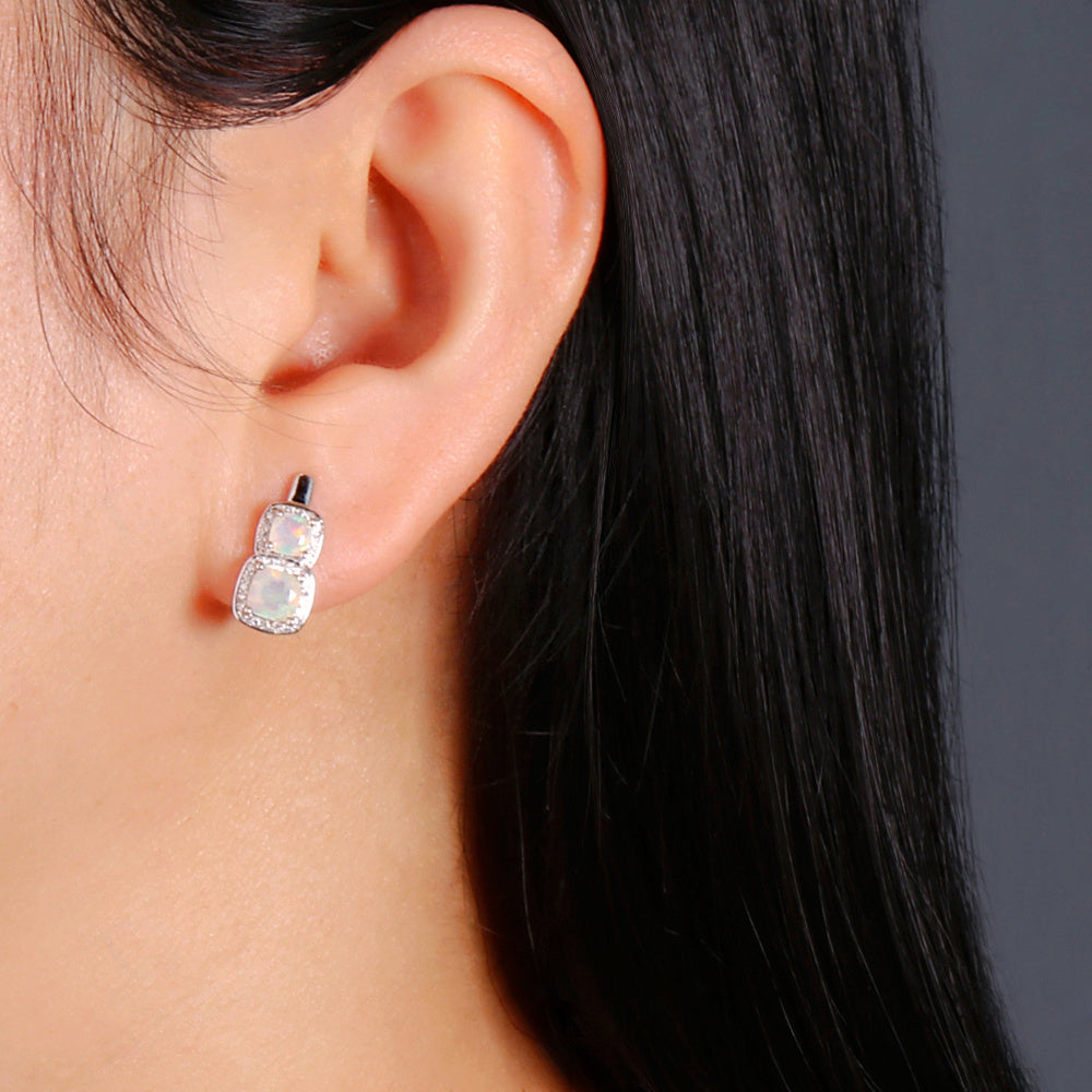 ‘Hadley’ Cushion Opal Double Halo Earrings – on ear