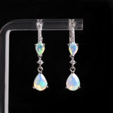 ‘Nevada’ Double Pear Opal Drop Earrings – on display stand