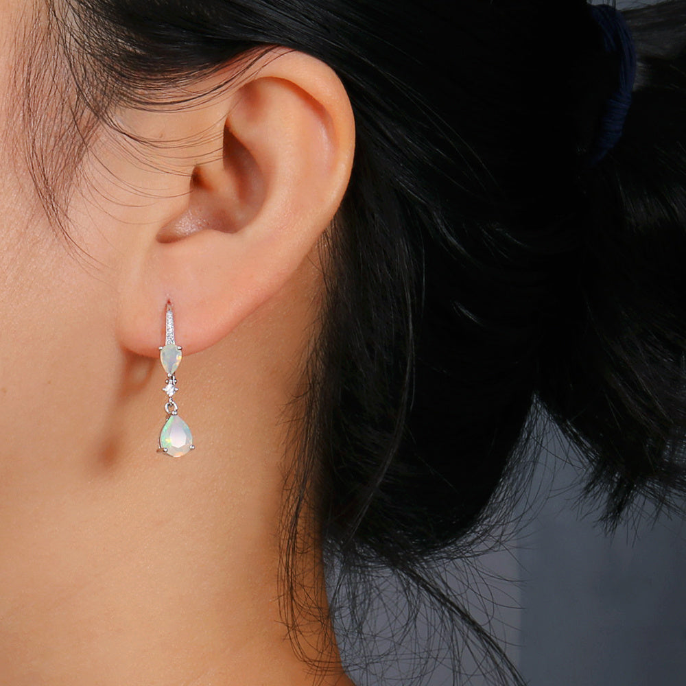 ‘Nevada’ Double Pear Opal Drop Earrings – on ear