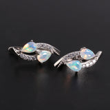 ‘Laguna’ Double Pear Opal Sweep Earrings – pair lying