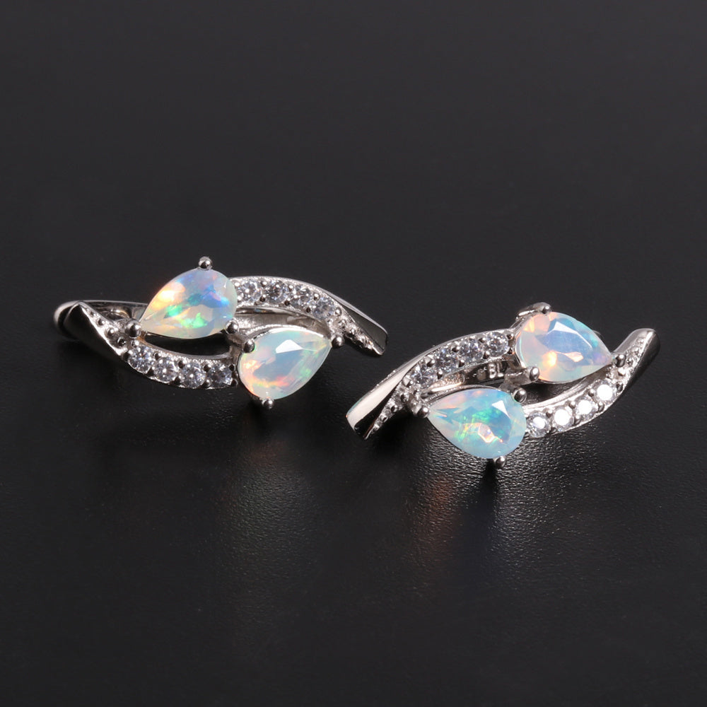 ‘Laguna’ Double Pear Opal Sweep Earrings – pair lying