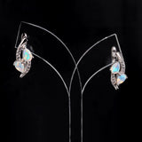 ‘Laguna’ Double Pear Opal Sweep Earrings – on display stand