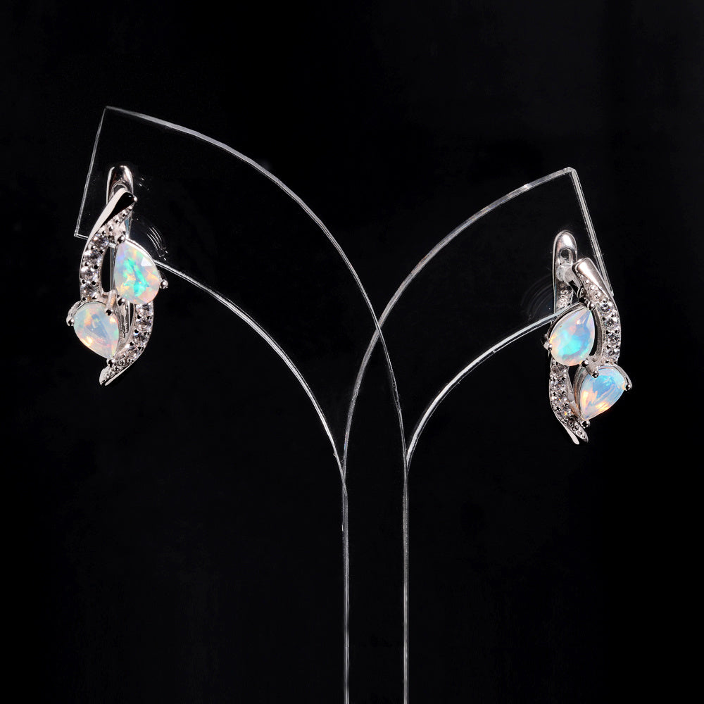 ‘Laguna’ Double Pear Opal Sweep Earrings – on display stand