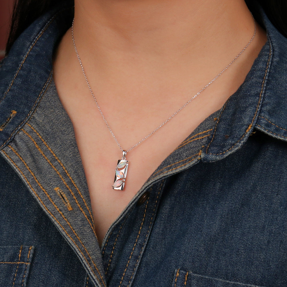 ‘Elodie’ Marquise Opal Bar Pendant – on neck close