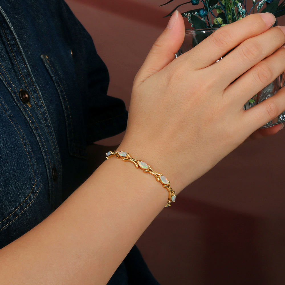 ‘Melrose’ Marquise Opal Cross Link Bracelet – on wrist gold
