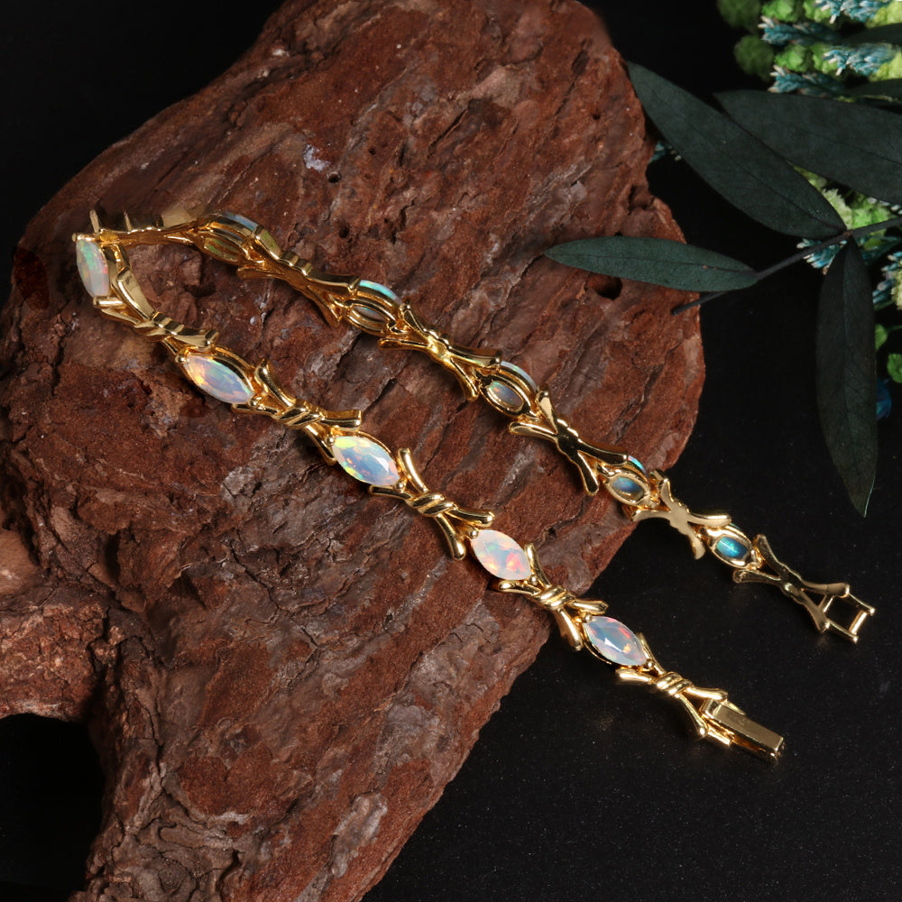 ‘Melrose’ Marquise Opal Cross Link Bracelet – on wood gold