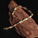 ‘Melrose’ Marquise Opal Cross Link Bracelet – draped bark gold