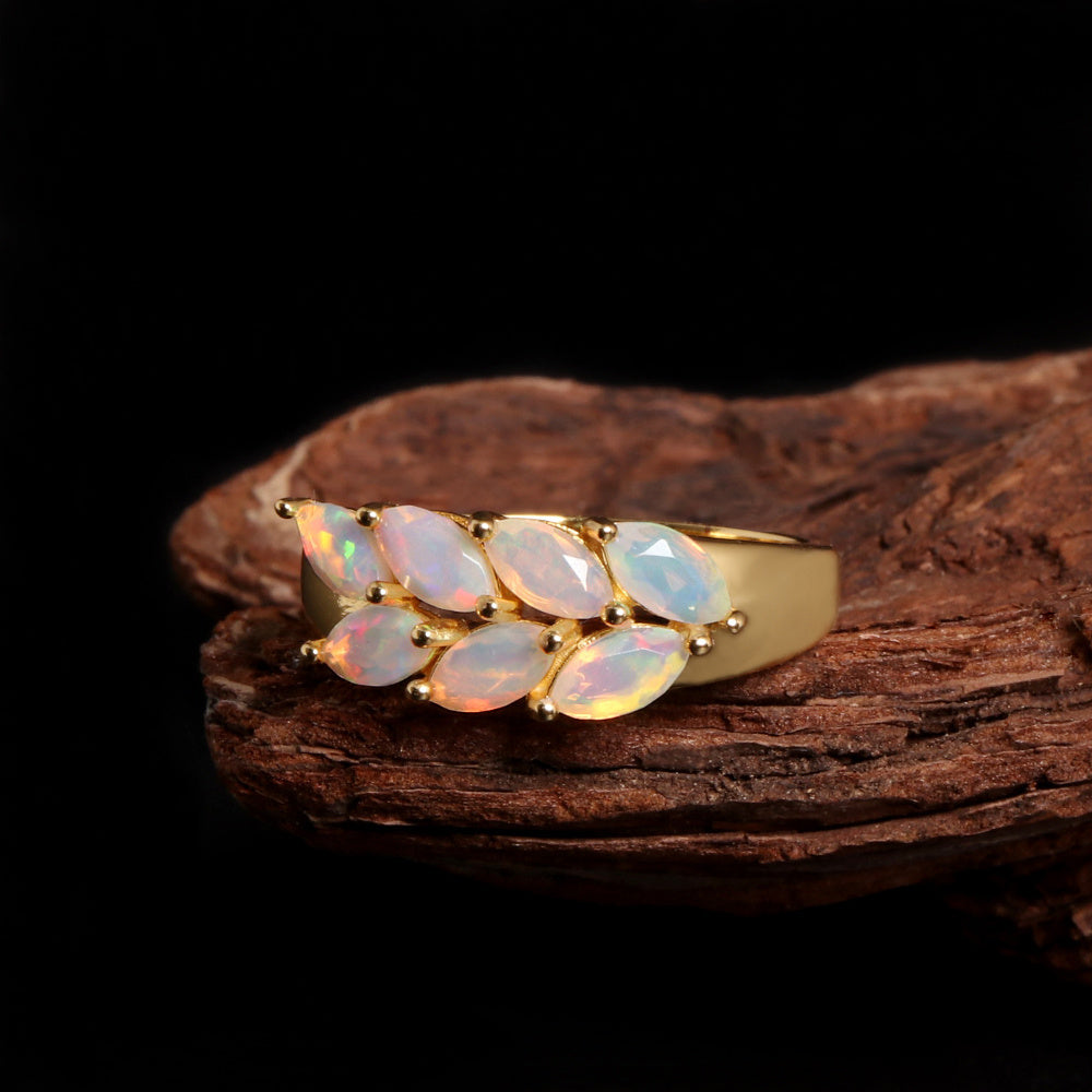 ‘Magnolia’ Marquise Opal Leaf Gold Ring – on wood
