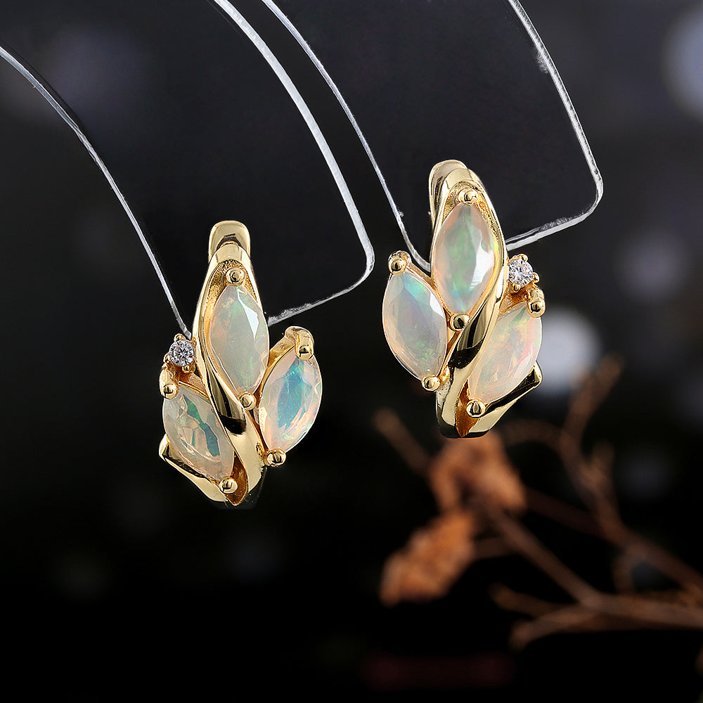 ‘Fern’ Marquise Opal Leaf Huggie Earrings – on display stand