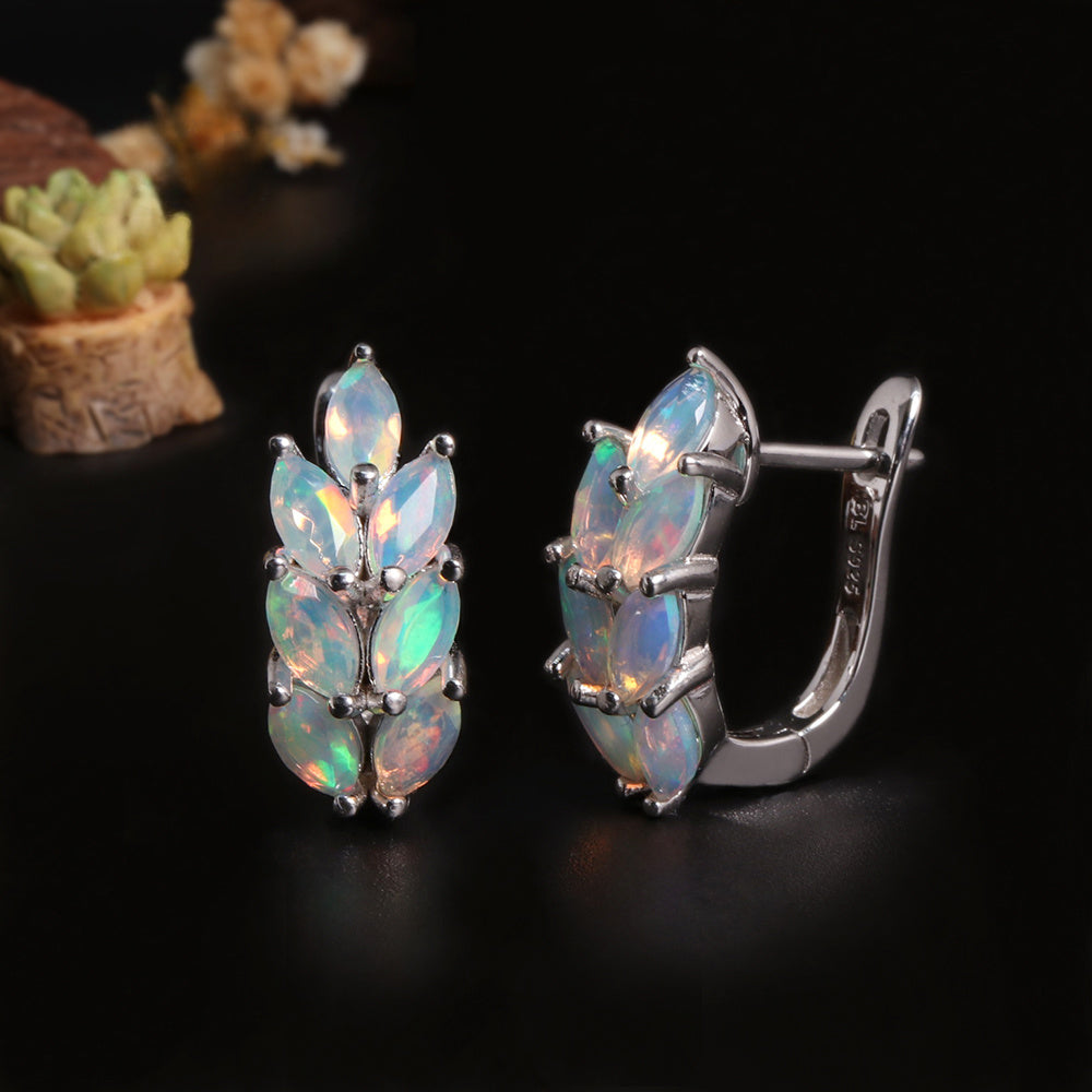 ‘Tawny’ Marquise Opal Wheat Huggie Earrings – angle with plant
