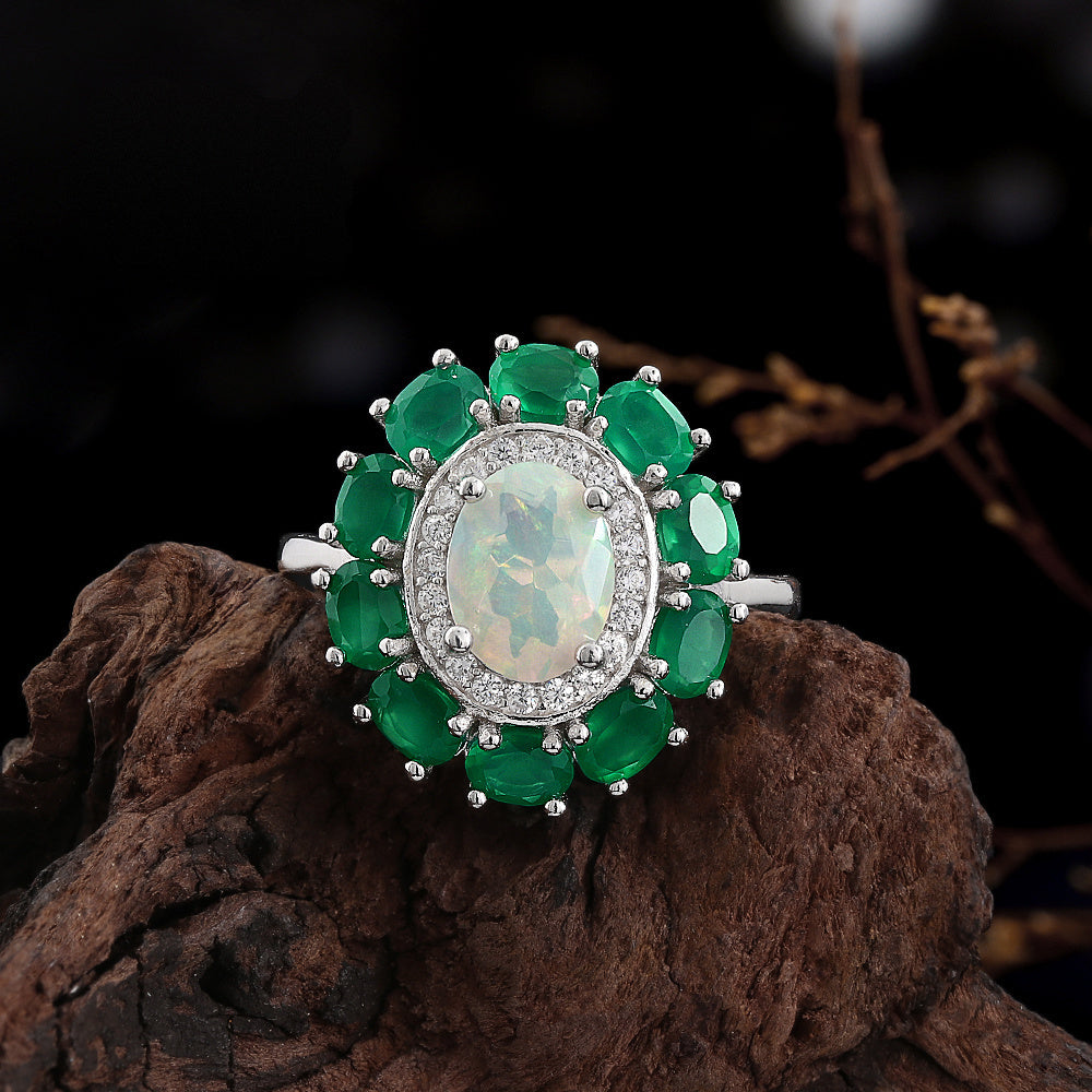 ‘Imogen’ Opal Green Agate Halo Ring – on wood