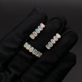 ‘Lacey’ Opal Row Ring Earring Set – on black glove