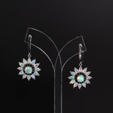 ‘Sunny’ Opal Sunflower Drop Earrings – hanging on stand