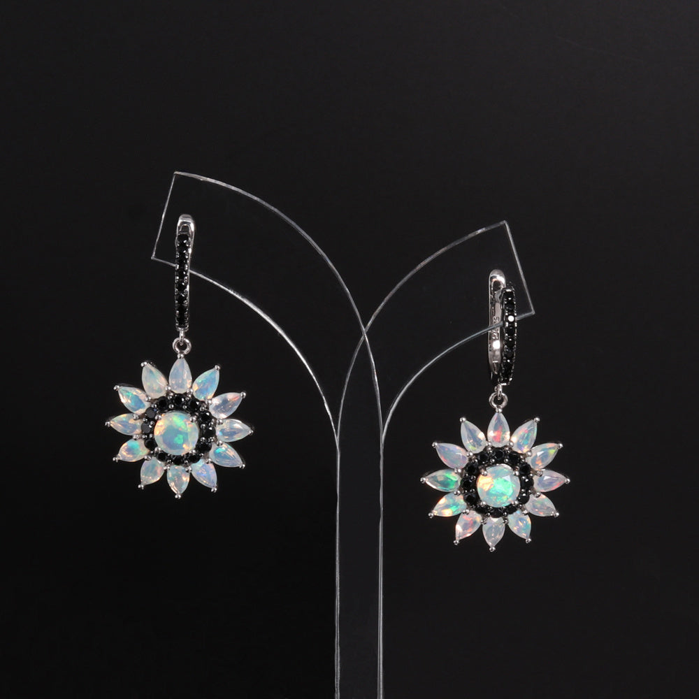 ‘Sunny’ Opal Sunflower Drop Earrings – hanging on stand