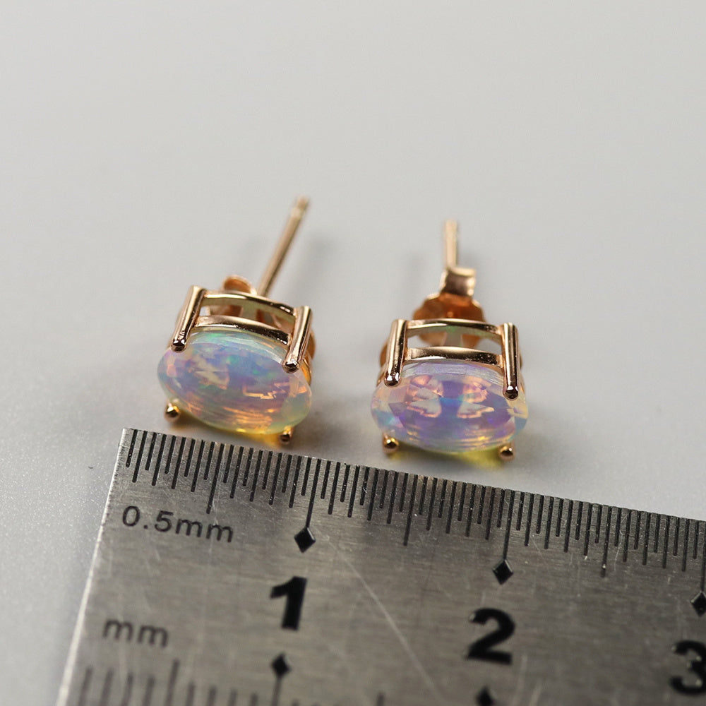 ‘Robin’ Oval Faceted Opal Stud Earrings – size with ruler