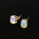 ‘Robin’ Oval Faceted Opal Stud Earrings – angled pair
