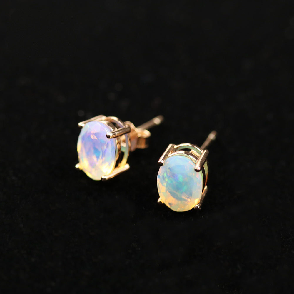 ‘Robin’ Oval Faceted Opal Stud Earrings – angled pair