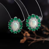 ‘Kallista’ Oval Opal Agate Halo Set – earrings on stand
