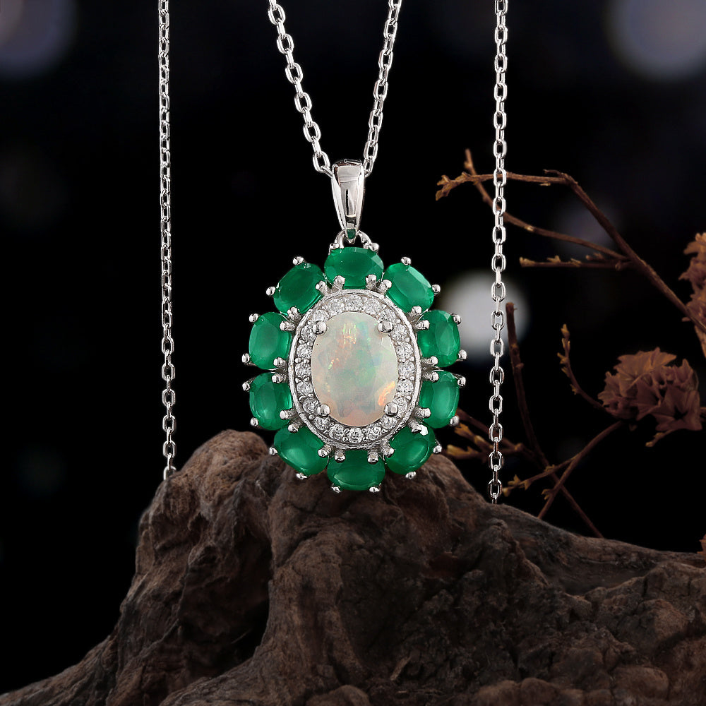 ‘Kallista’ Oval Opal Agate Halo Set – pendant on wood