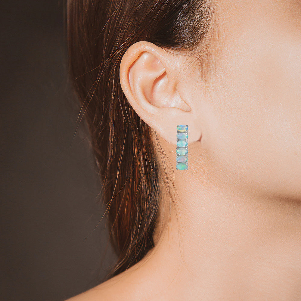 ‘Stevie’ Oval Opal Bar Huggie Earrings – on ear