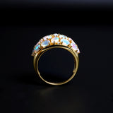 ‘Addie’ Oval Opal Cluster Dome Ring – yellow front standing