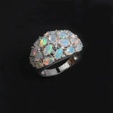 ‘Addie’ Oval Opal Cluster Dome Ring – white angle view