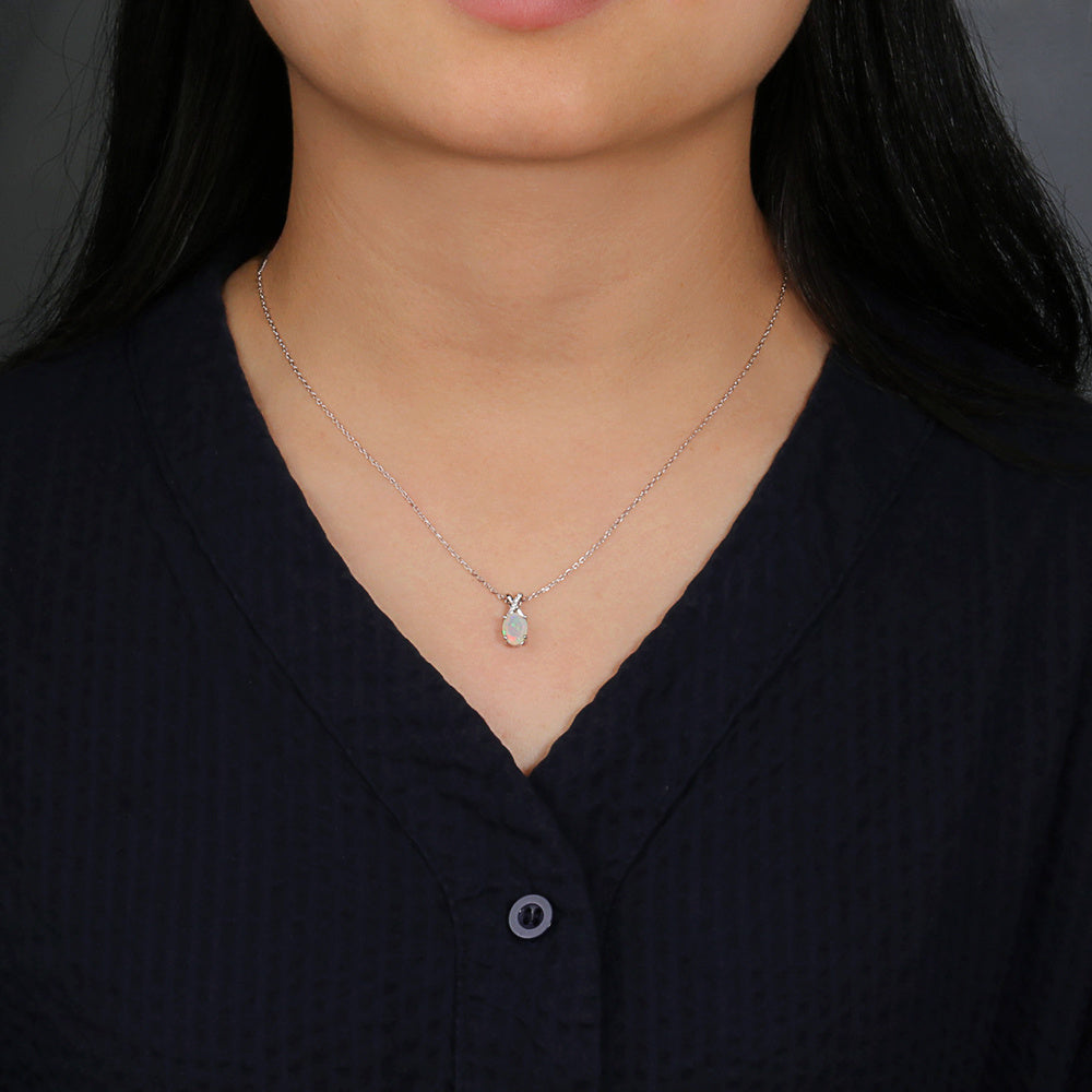 ‘Mercy’ Oval Opal Cross Bail Pendant – on neck