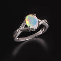 ‘Blythe’ Oval Opal Crossover Solitaire Ring