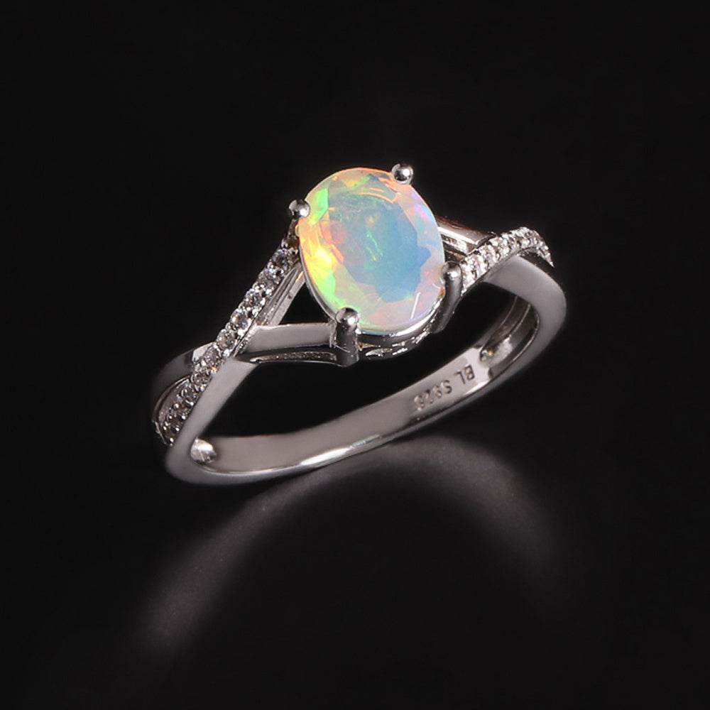 ‘Blythe’ Oval Opal Crossover Solitaire Ring